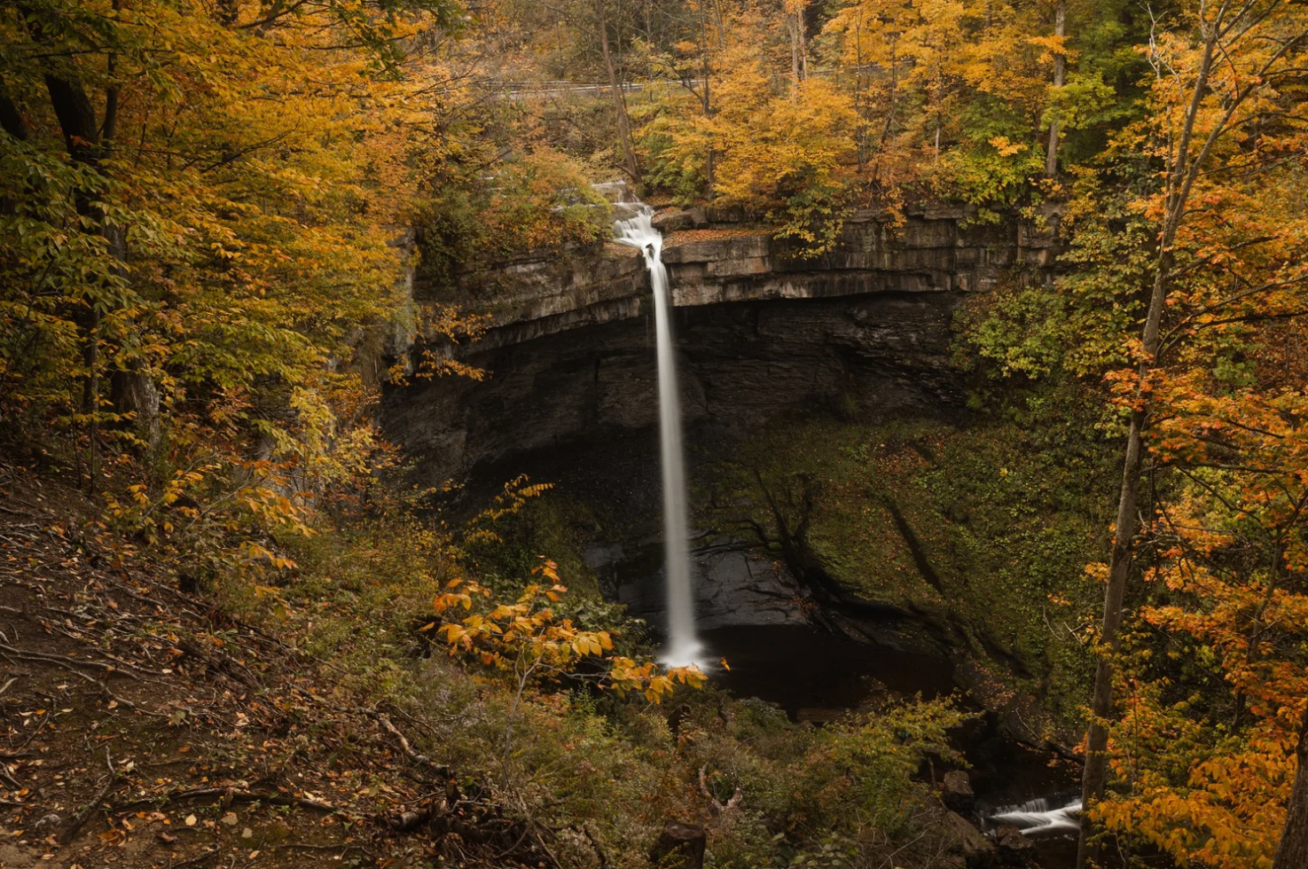 Carpenter Falls surrounded by fall foliage near Skaneateles, New York.